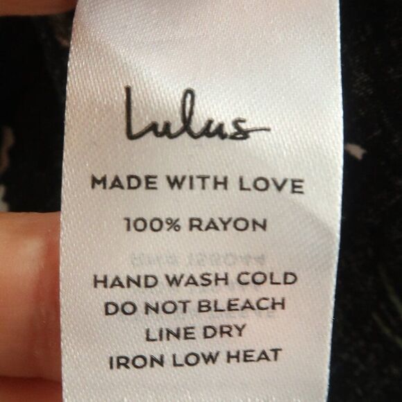 LULU'S BOUQUETS FOR YOU BLACK FLORAL SLEEVELESS HIGH NECK SMOCKED MINI DRESS - Picture 5 of 10